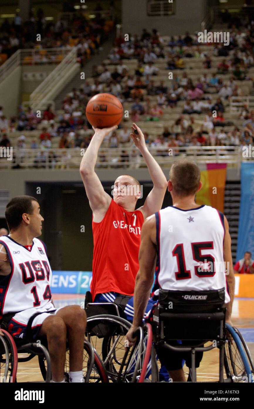 Under pressure from USA defence Terry Bywater of Great Britain lines up