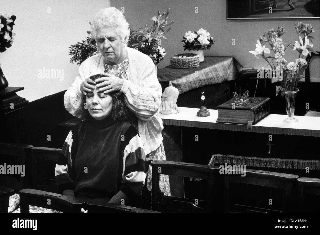 Hands on spiritual healing in a spiritual church Stock Photo Alamy