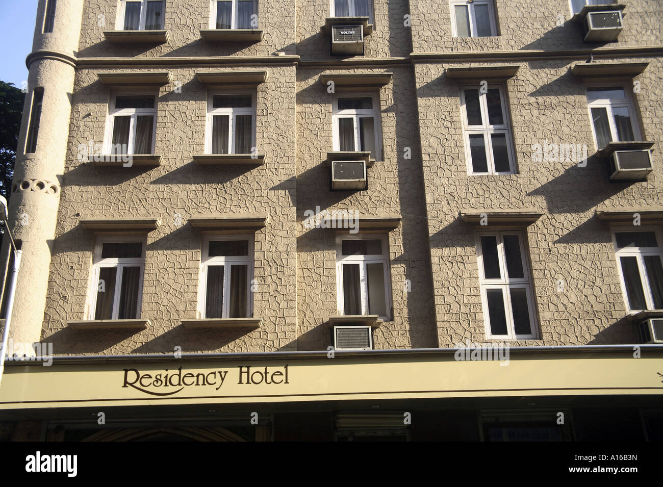 Ten windows of Residency Hotel old British gothic architecture on D N road near Handloom house