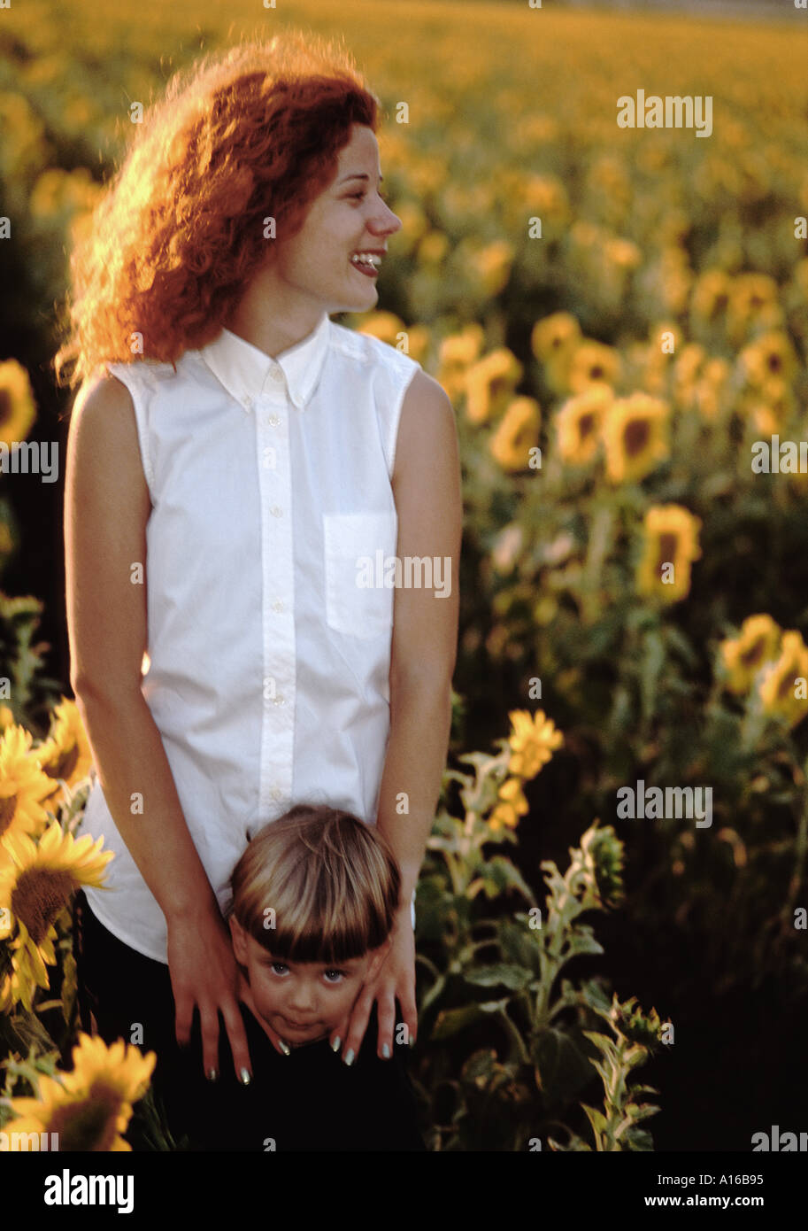 Mother and son in a sunflower field southern france Stock Photo - Alamy
