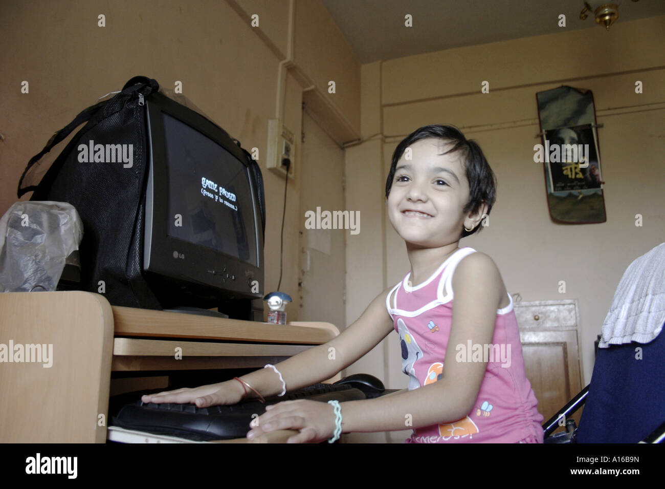 RSC102059 Young Indian little girl working on computer Bombay Mumbai Maharashtra IndiaSrishti Model released 542 Stock Photo
