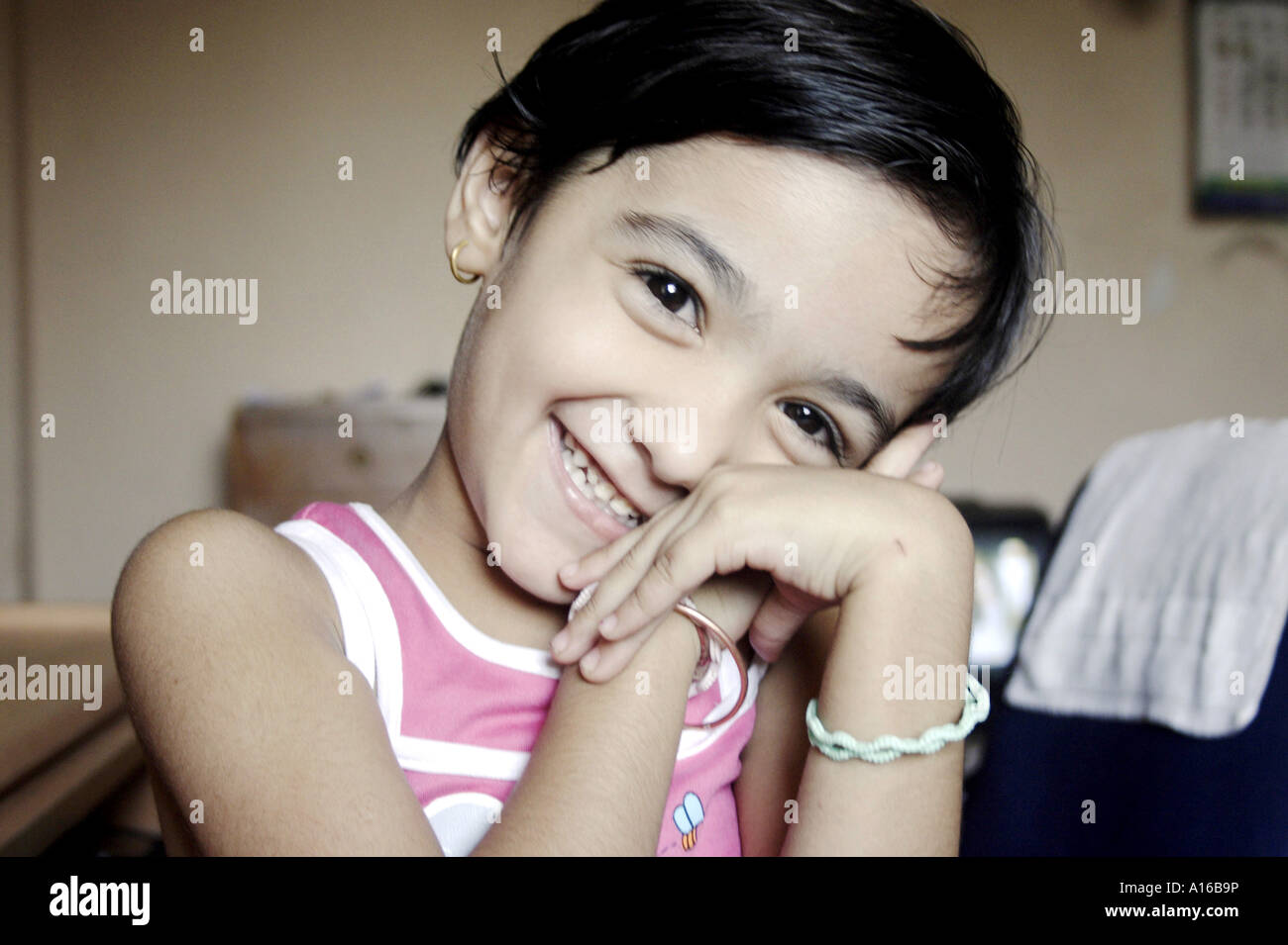 RSC102060 Young Indian little girl smiling Bombay Mumbai Maharashtra IndiaSrishti Model released 542 Stock Photo