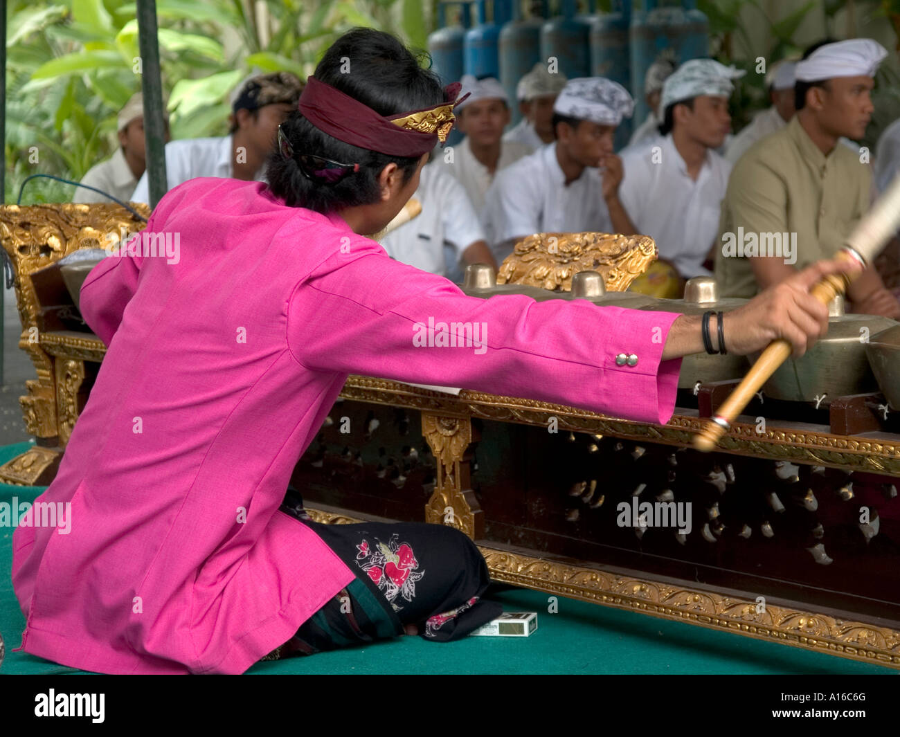 Photograph of a traditional gamelan orchestra during blessing of a hotel shrine in Bali Indonesia Stock Photo