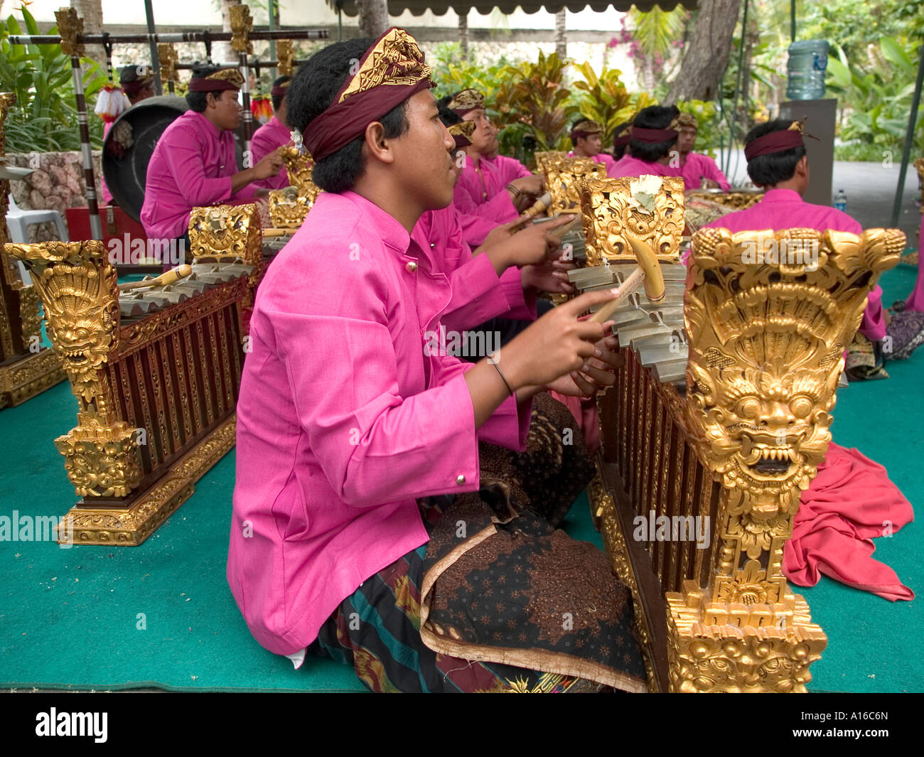 Photograph of a traditional gamelan orchestra during blessing of a hotel shrine in Bali Indonesia Stock Photo