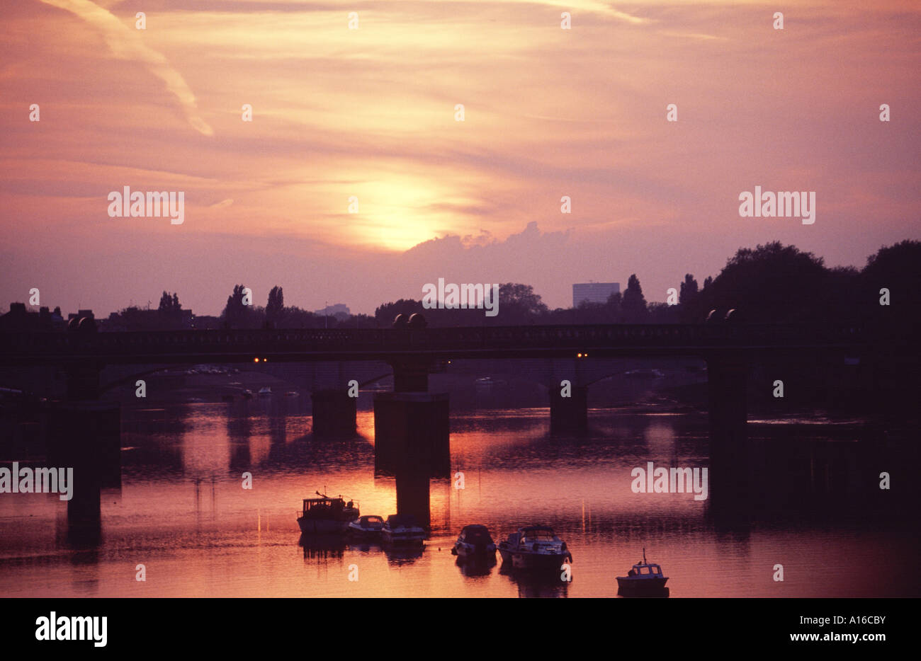 Sunset on the Thames river at Putney Bridge West London United Kingdom Stock Photo