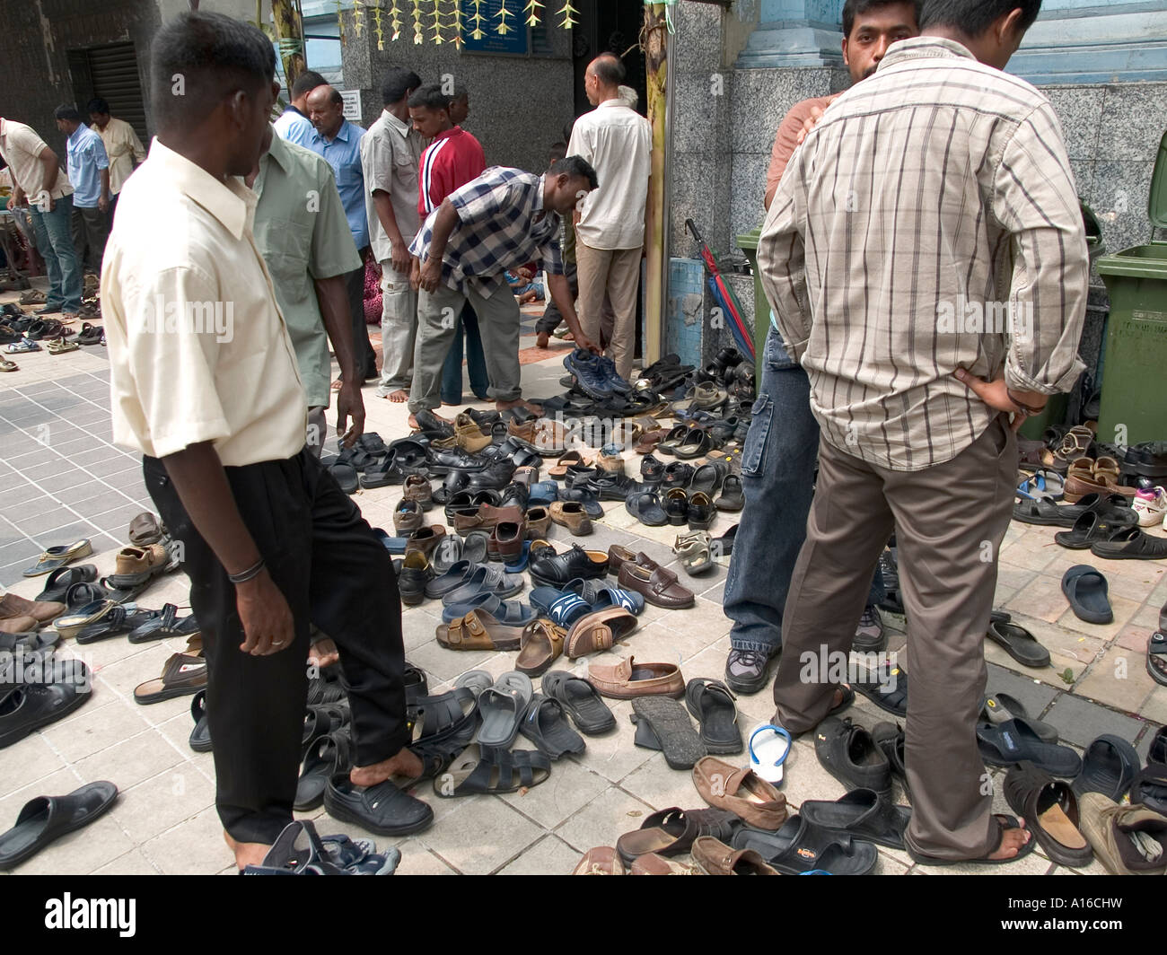 Shoes of Hindu worshippers left outside the Sri Marianman Hindu temple in Jalan HS Lee Kuala Lumpur Malaysia during Deepavali Stock Photo