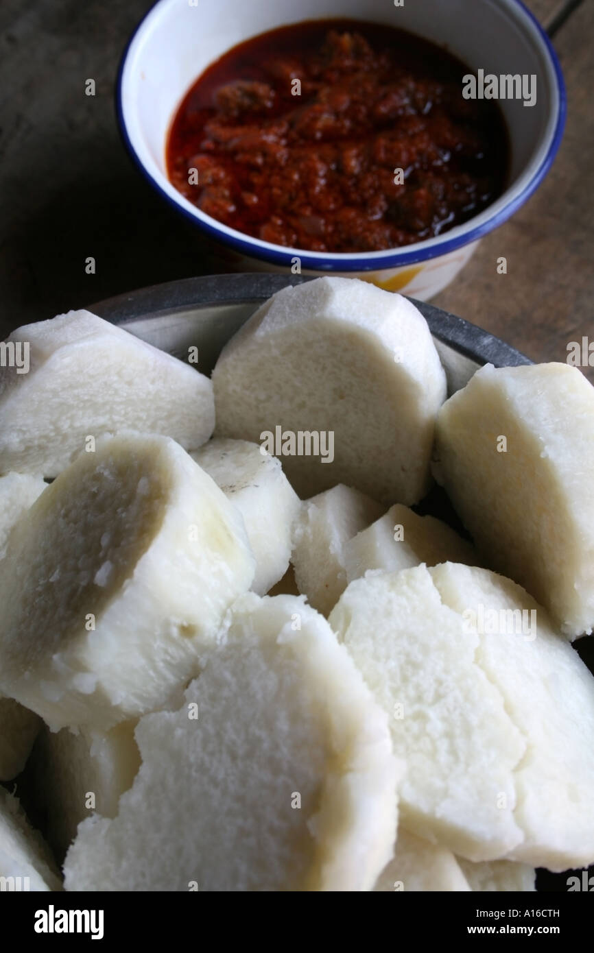 boiled yam with tomato and chilli sauce, Kpalime Stock Photo Alamy