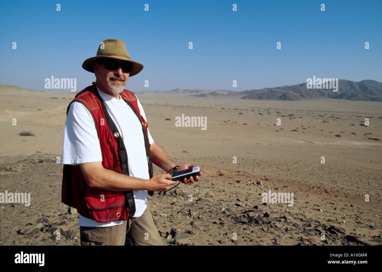 geologist with GPS in Atacama Desert Chile Stock Photo