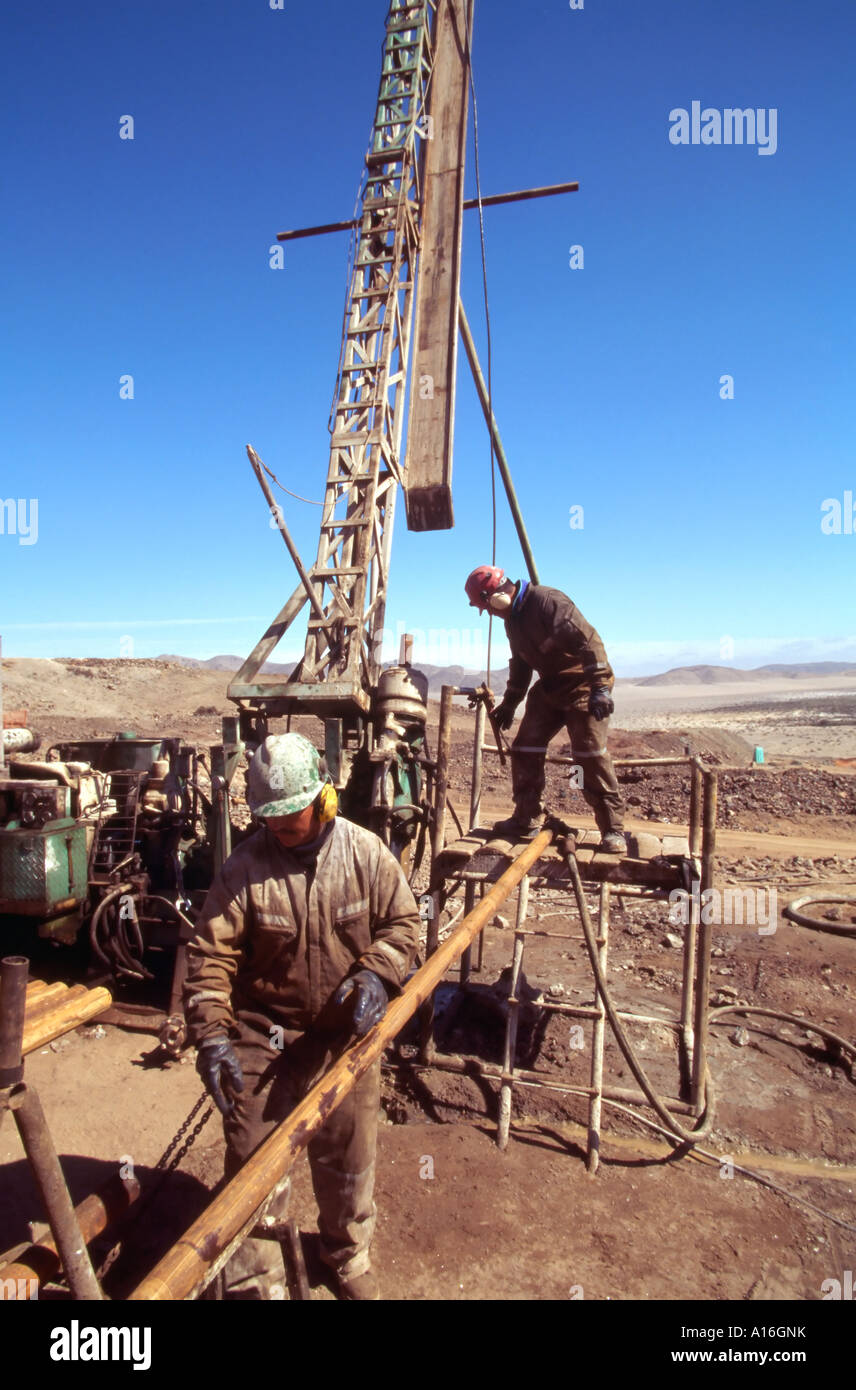 drill crew with their rig at mining camp Atacama Desert Chile Stock Photo