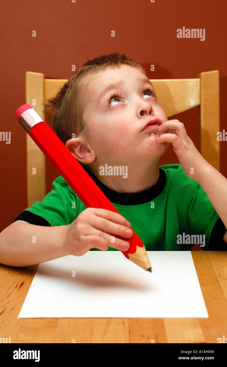 little person holding a big pencil png