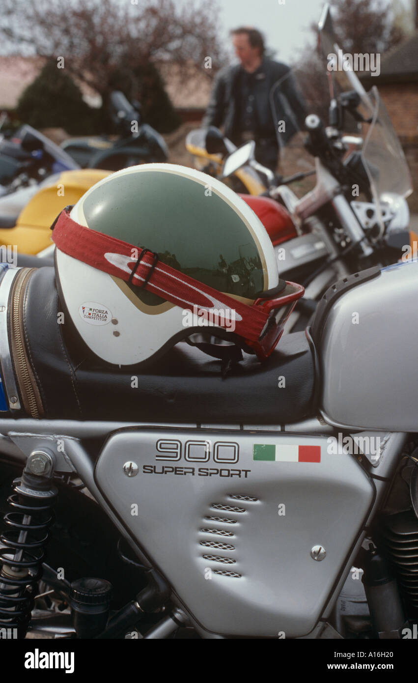 Helmet on the seat of an old Ducati 900SS Stock Photo