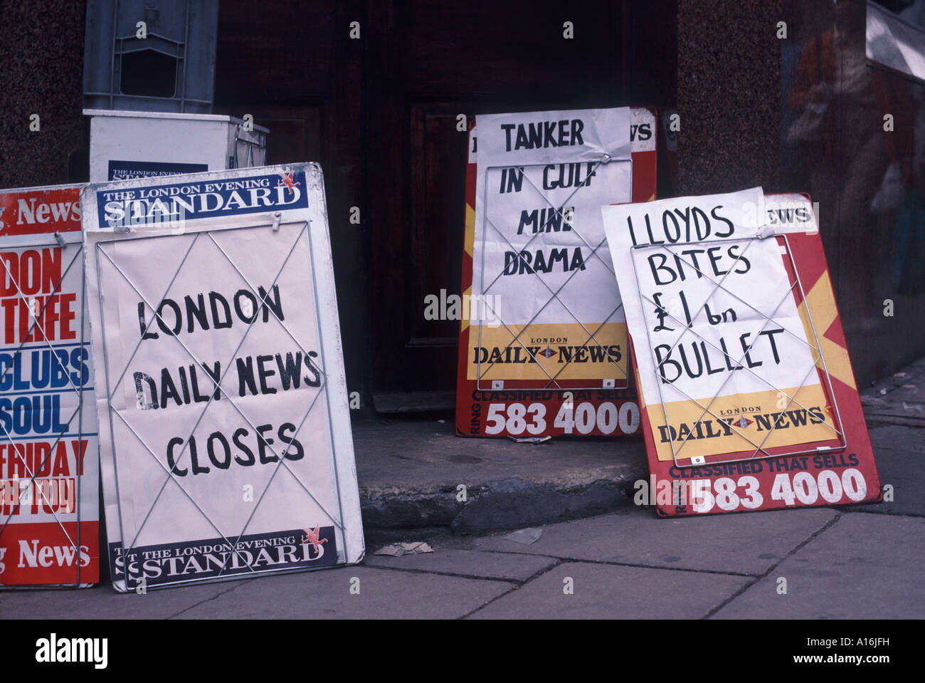 Sandwich board signs declaring closure of newspaper 'London Daily News' in July 1987, London, England Stock Photo