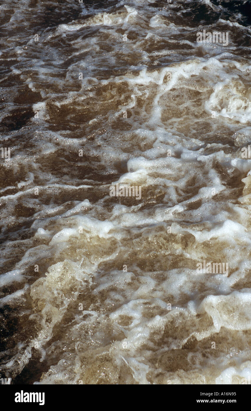 Water flowing and frothing Stock Photo