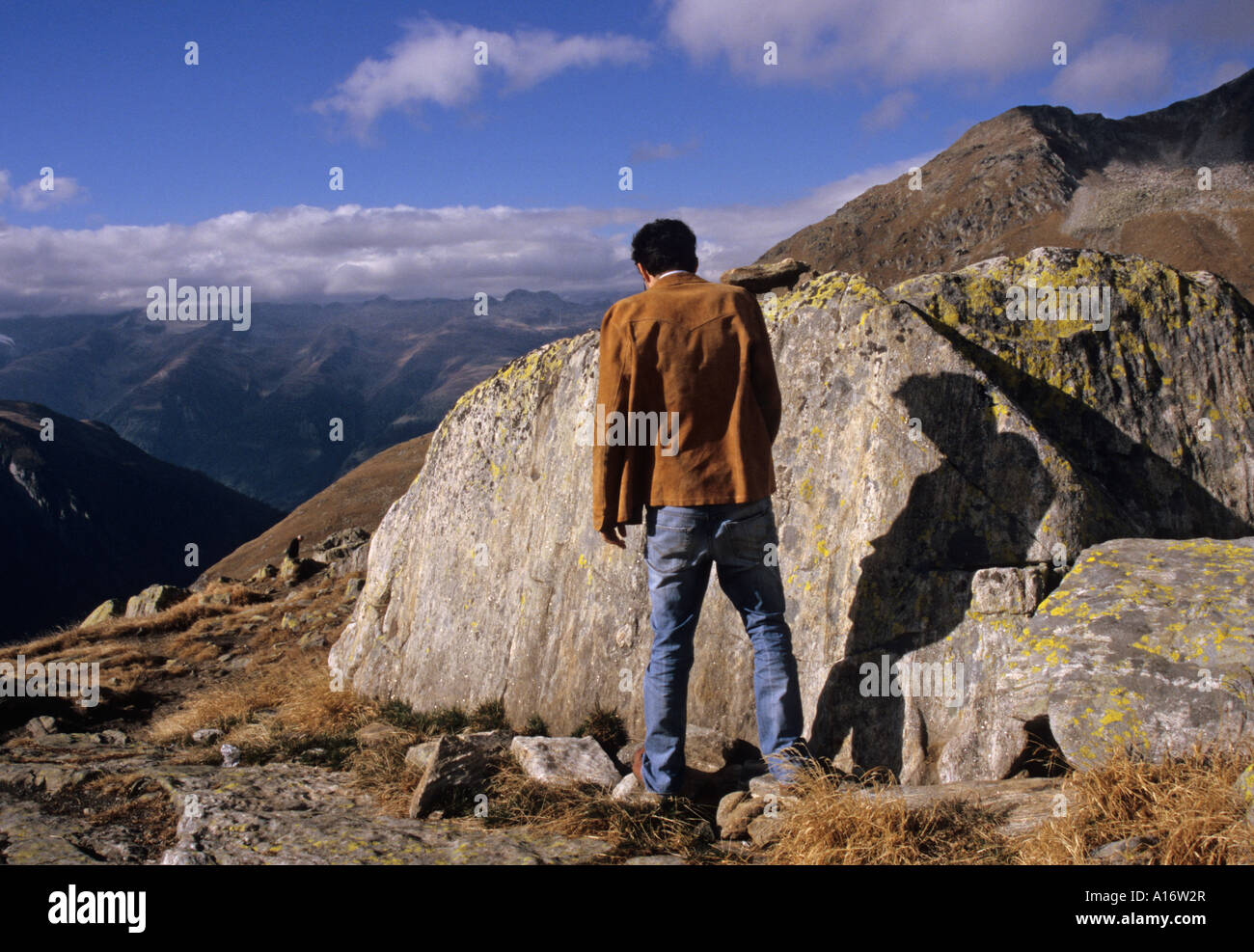 tourist-peeing-on-the-swiss-alps-stock-photo-alamy