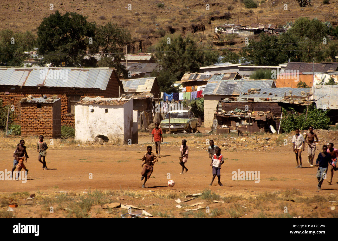 Alexandra Township Johannesburg South Africa play football soccer ball