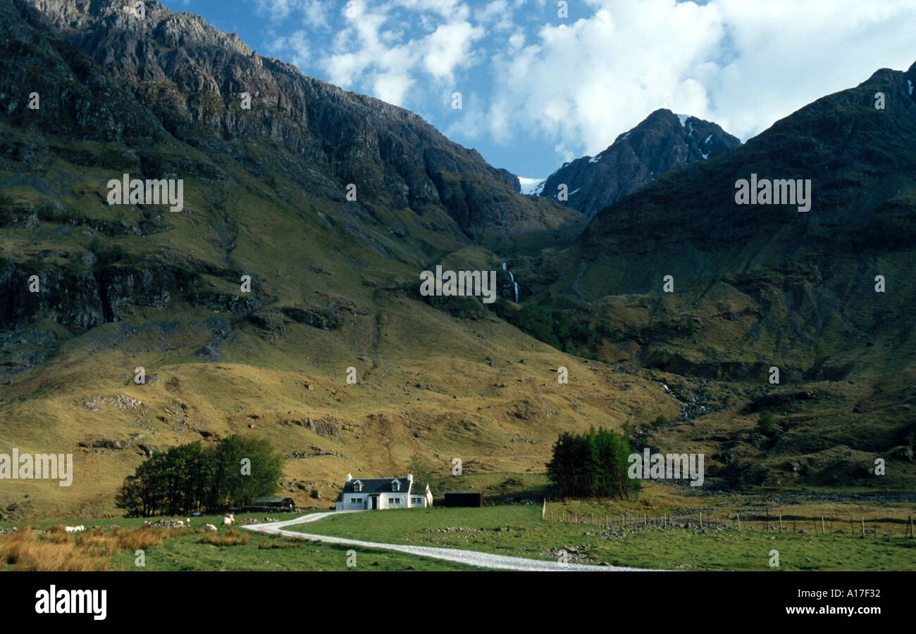 Glencoe in Scotland House with mountains Stock Photo - Alamy