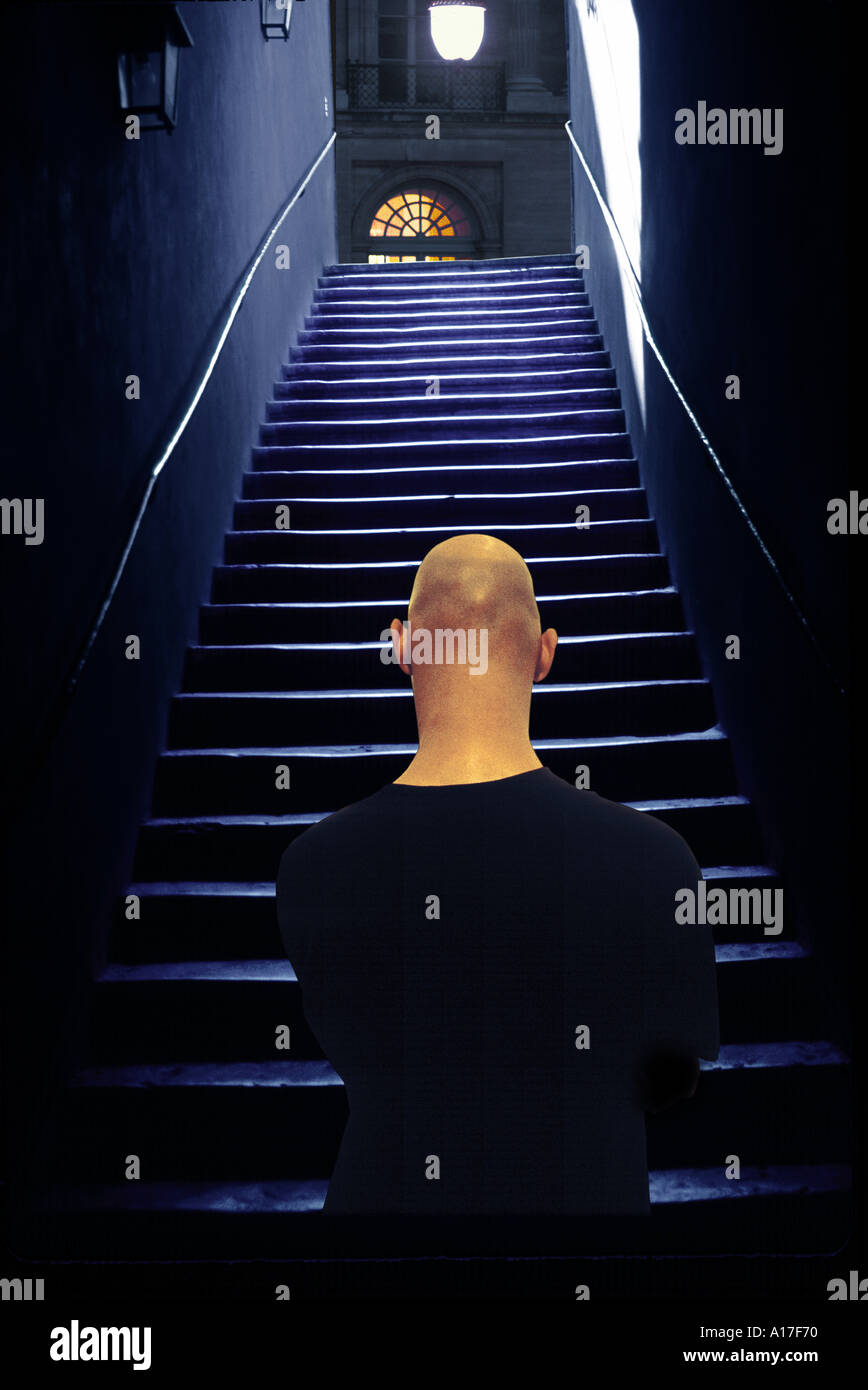 man in front of stairs Stock Photo