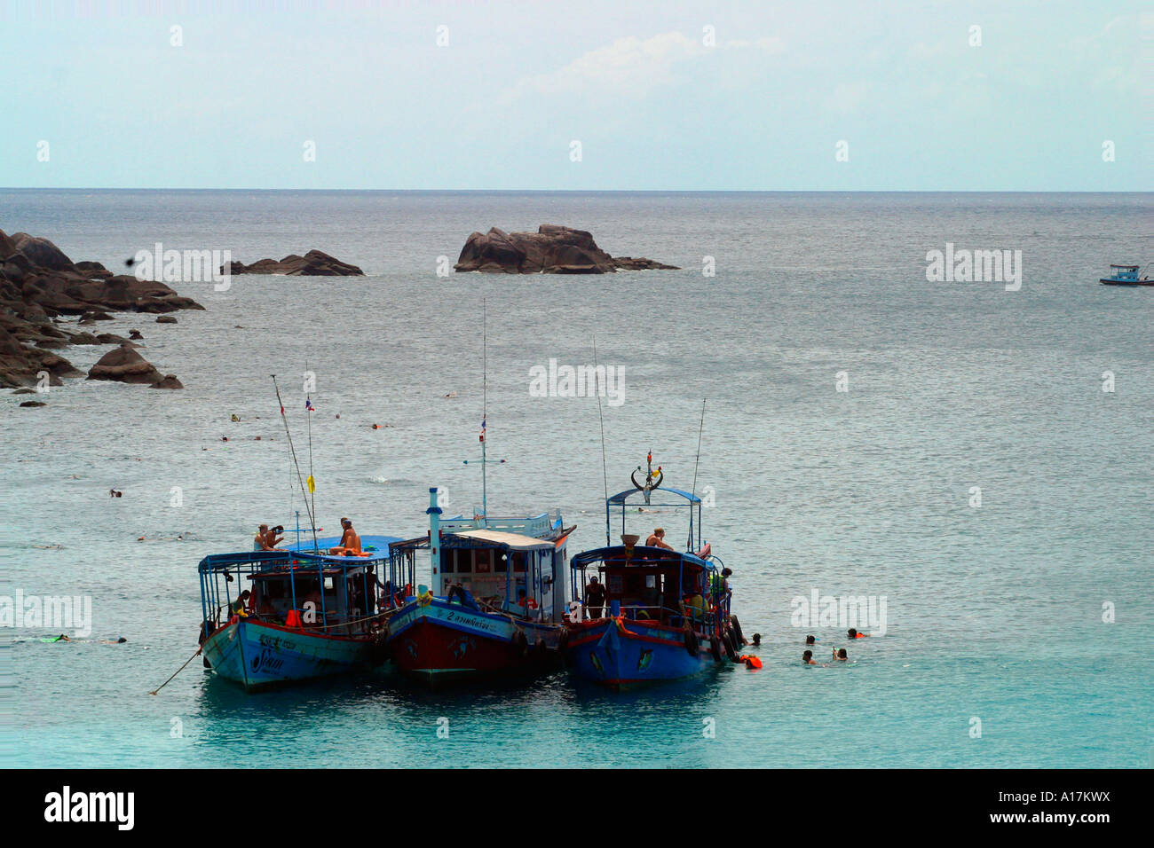 A Fishing boat mores off the coast on Koh Tao, tranquil, tranquility