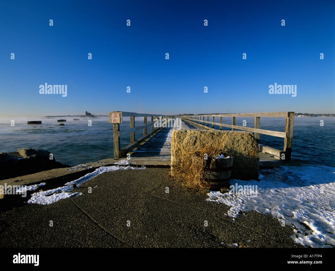 Long wooden wharf pier at Fort Foster which is an old Military base