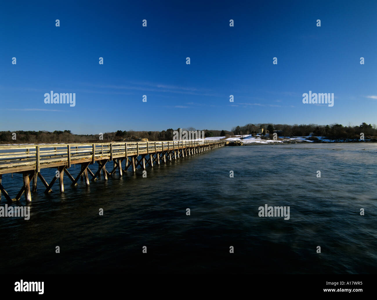 Long wooden wharf pier at Fort Foster which is an old Military base