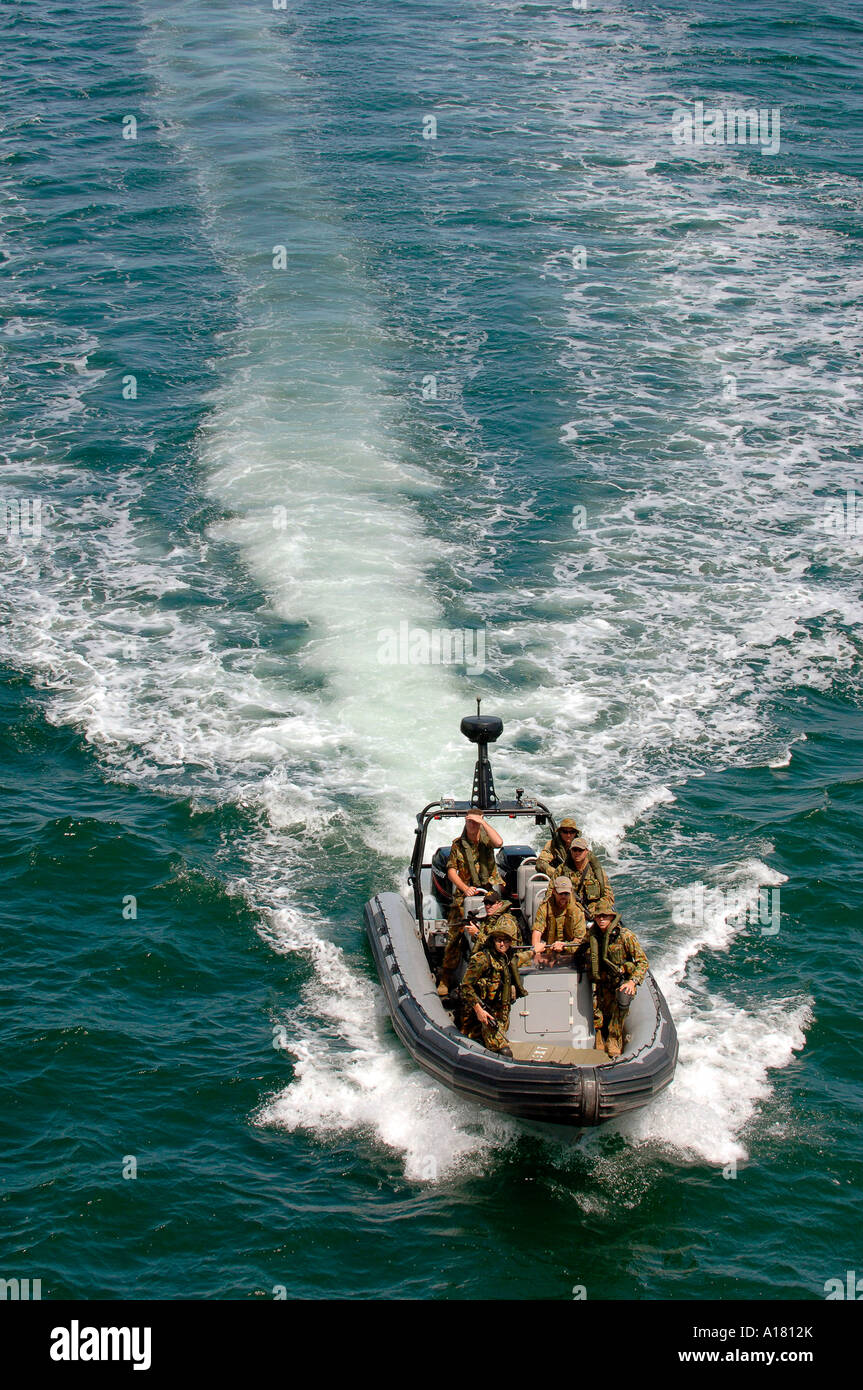 Australian Clearance Diving Team board the guided-missile cruiser USS Valley Forge during a Vehicle Board Search and Seizure. Stock Photo