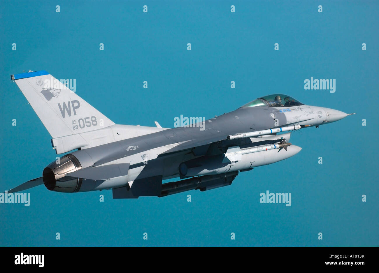 An F-16 Fighting Falcon controls the range off the coast of South Korea during an AIM-9 Sidewinder live-fire exercise August 18 Stock Photo