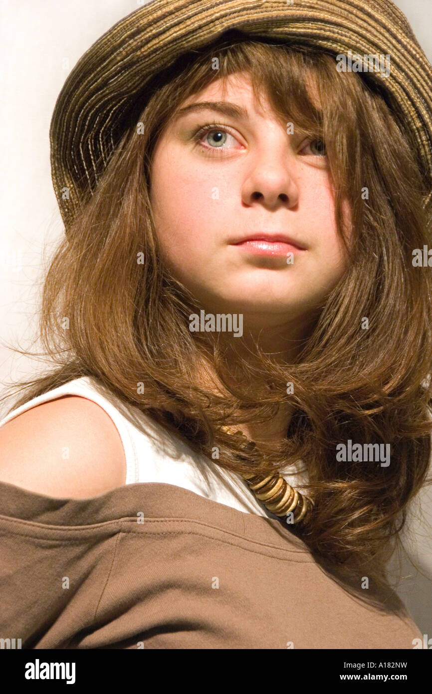 Portrait of young girl in brown hat Stock Photo - Alamy
