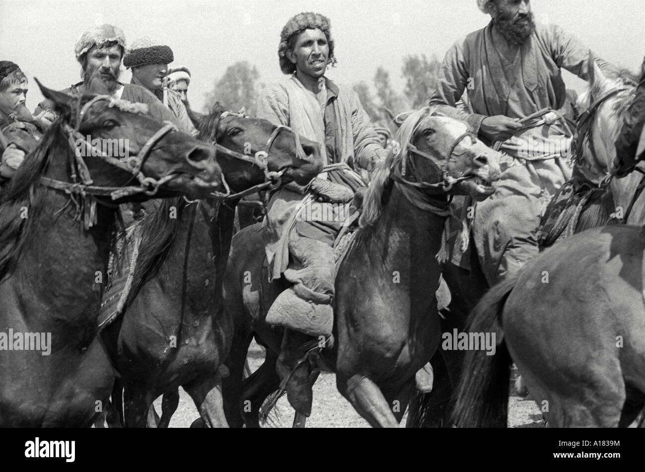 B/W of Afghani horsemen playing their traditional game of Buskashi. Afghanistan Stock Photo