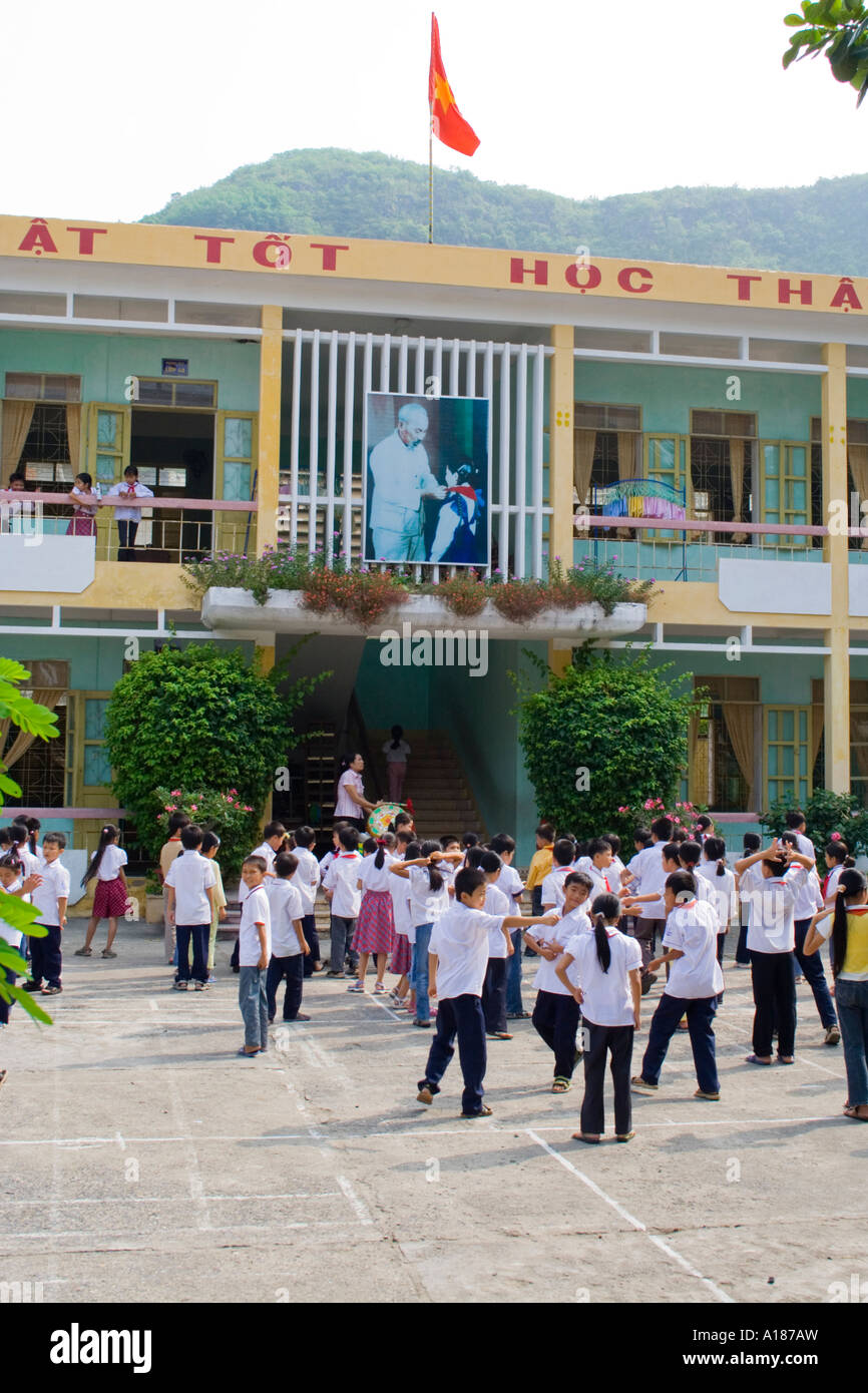 2007 Children Heading Inside from the Playground at School Cat Ba Town Cat Ba Island Halong Bay Vietnam Stock Photo