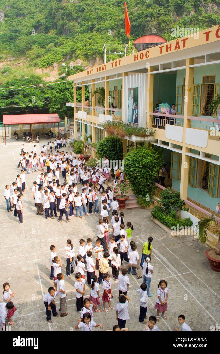 2007 Children Heading Inside from the Playground at School Cat Ba Town Cat Ba Island Halong Bay Vietnam Stock Photo