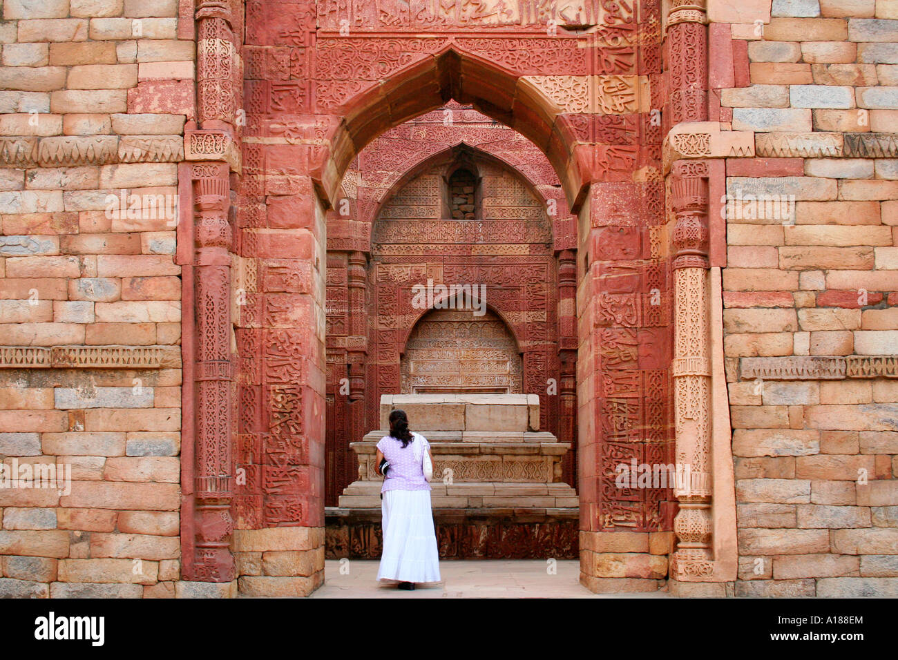 Tourist visiting a tomb in the Qutb Minar complex New Delhi Stock Photo
