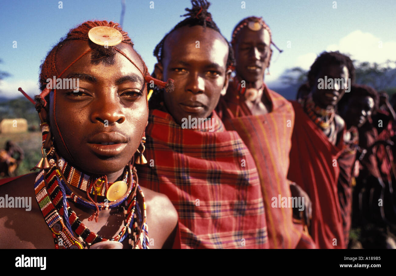 Maasai Moran in a communal village as they await the coming of the manhood ceremony Kajiado Kenya Stock Photo