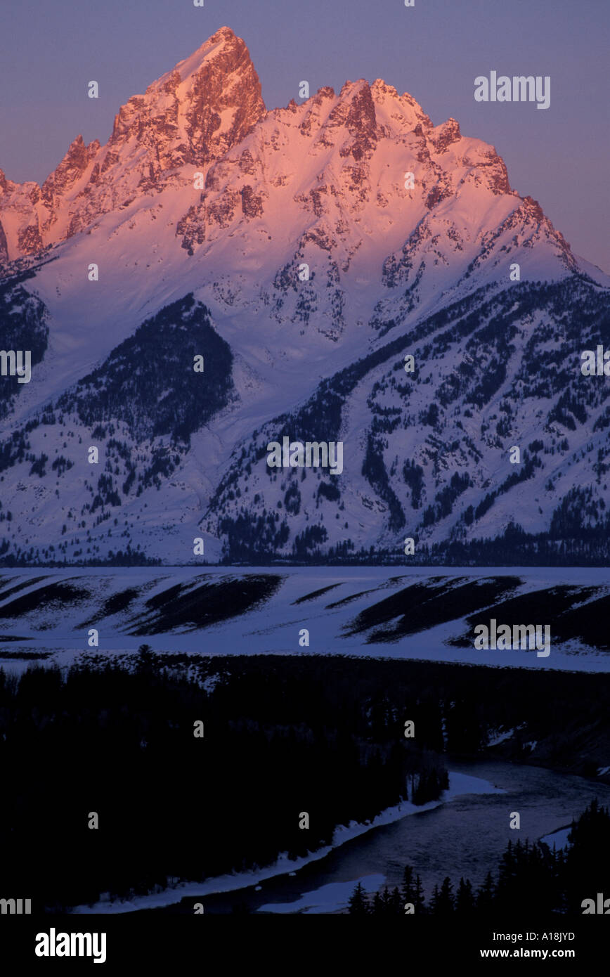 Snake River Overlook Grand Teton N P A full moon sets behind the Tetons