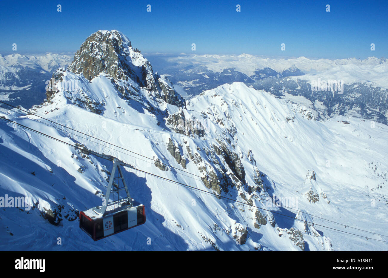 Courchevel ski slopes in mountains of the Trois Vallees Three Valleys ski region of French Alps 
