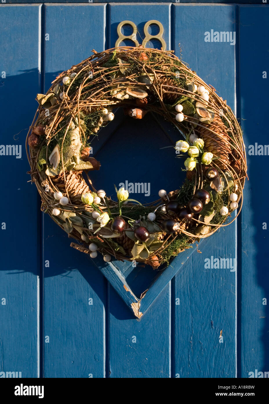 England UK Christmas wreath on a front door Stock Photo Alamy