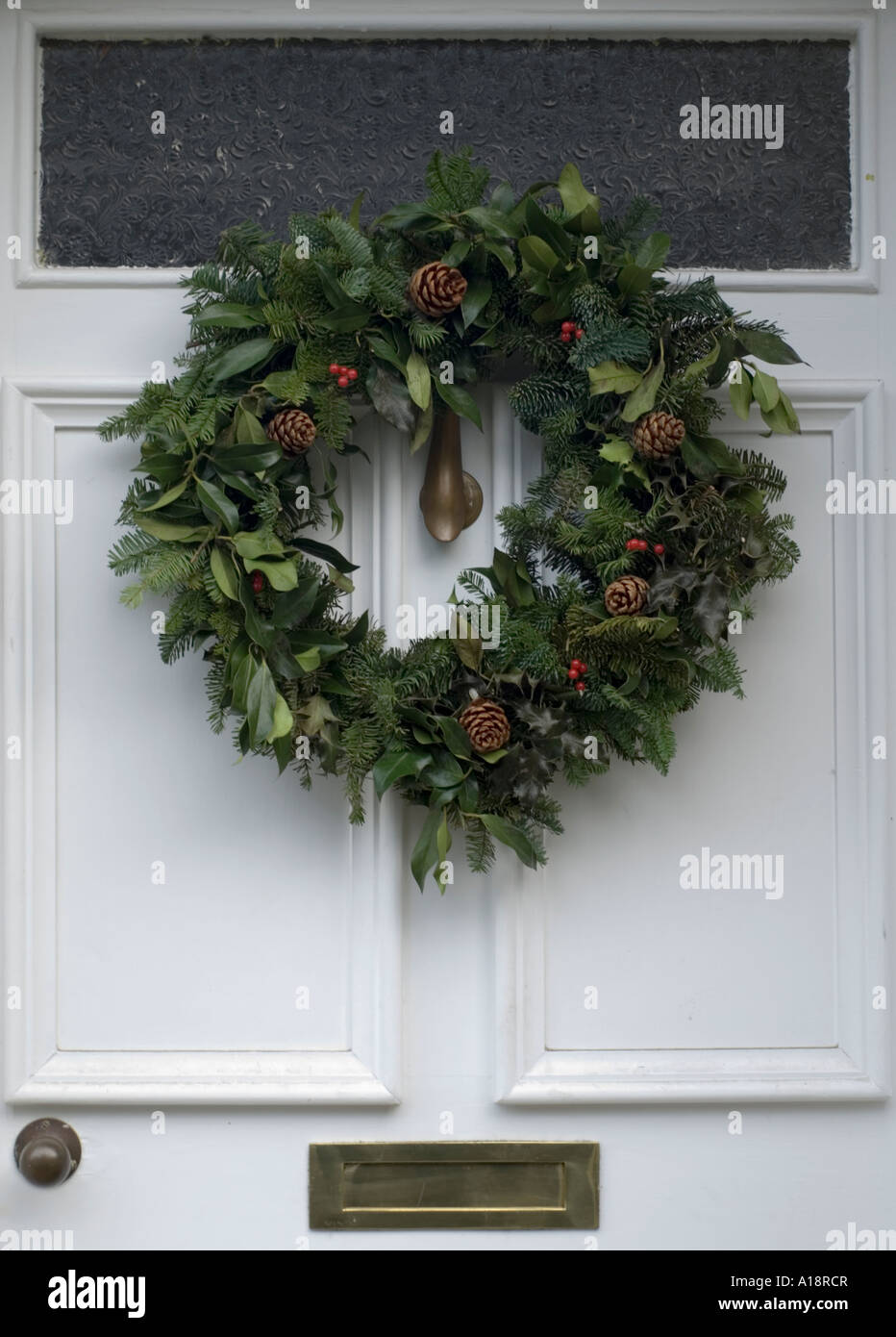 England UK Christmas wreath on a front door Stock Photo Alamy