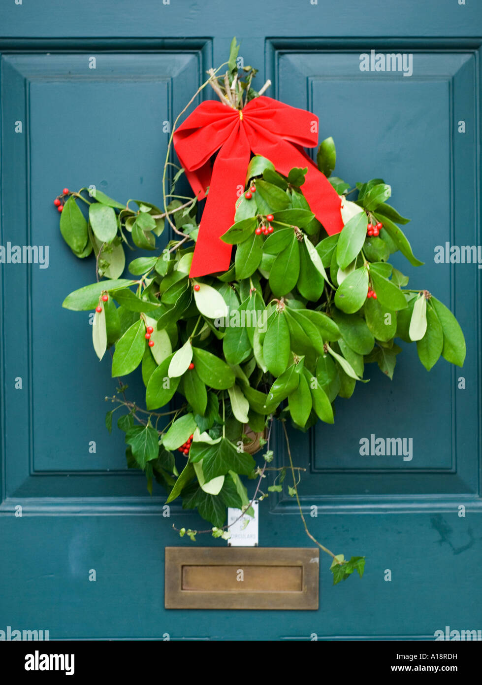 England UK Christmas wreath on a front door Stock Photo Alamy