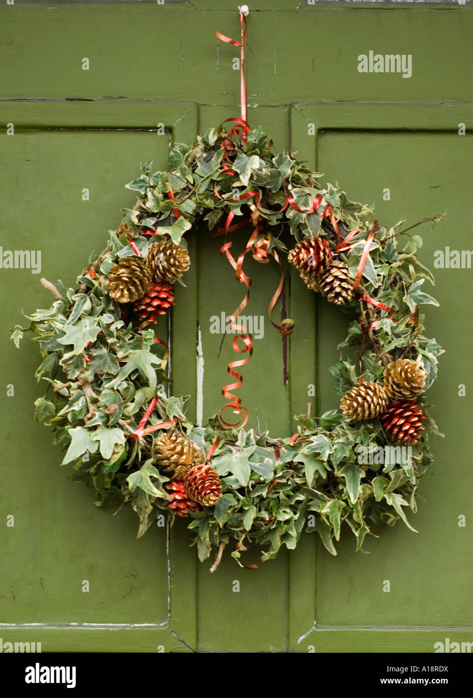 Christmas wreath on a front door Stock Photo Alamy