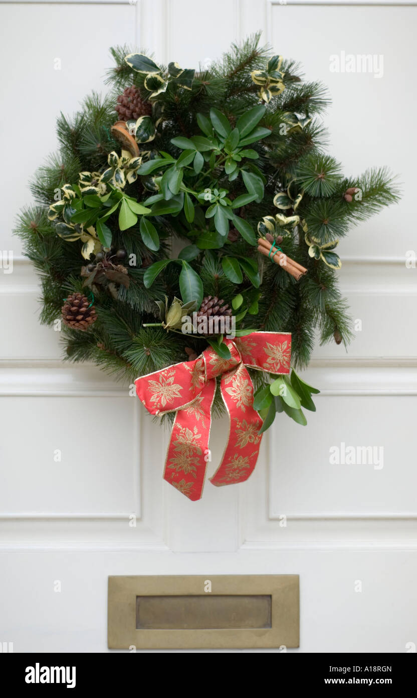 England UK Christmas wreath on a front door Stock Photo Alamy