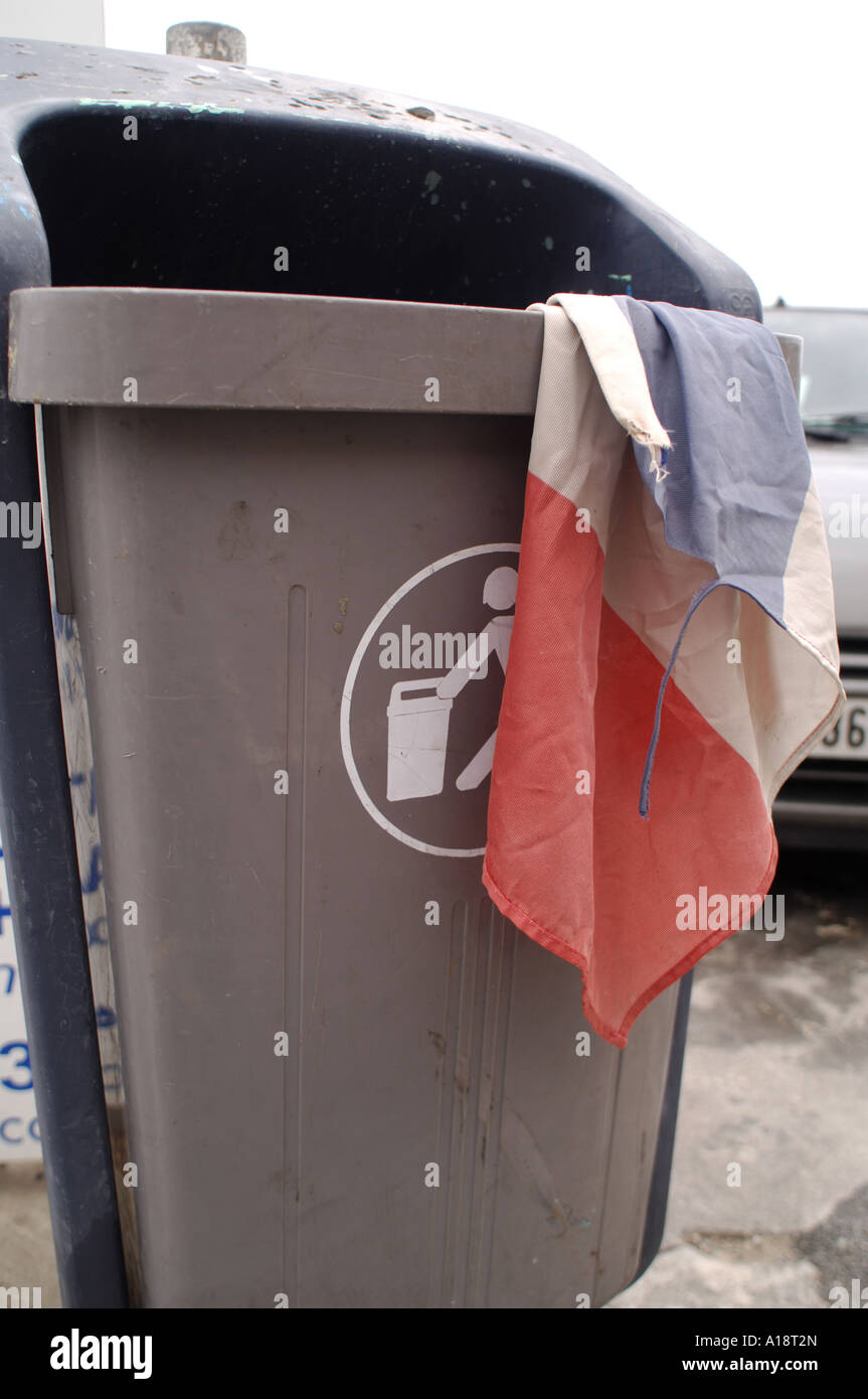 French flag left in a dustbin in Antibes South of France Stock Photo