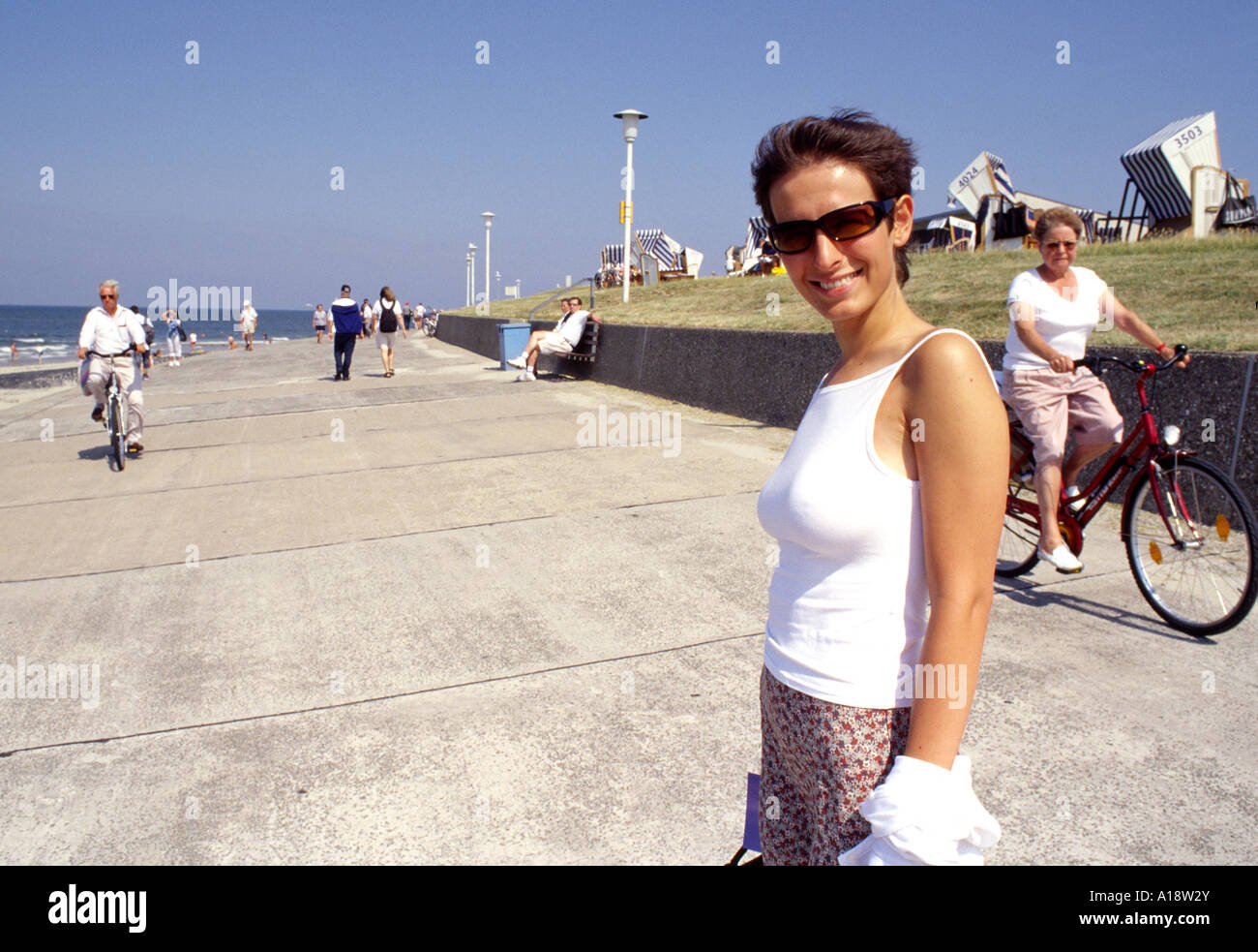 Girl on holiday on the Frisian Island of Norderney in northern Germany North Sea coast Stock Photo