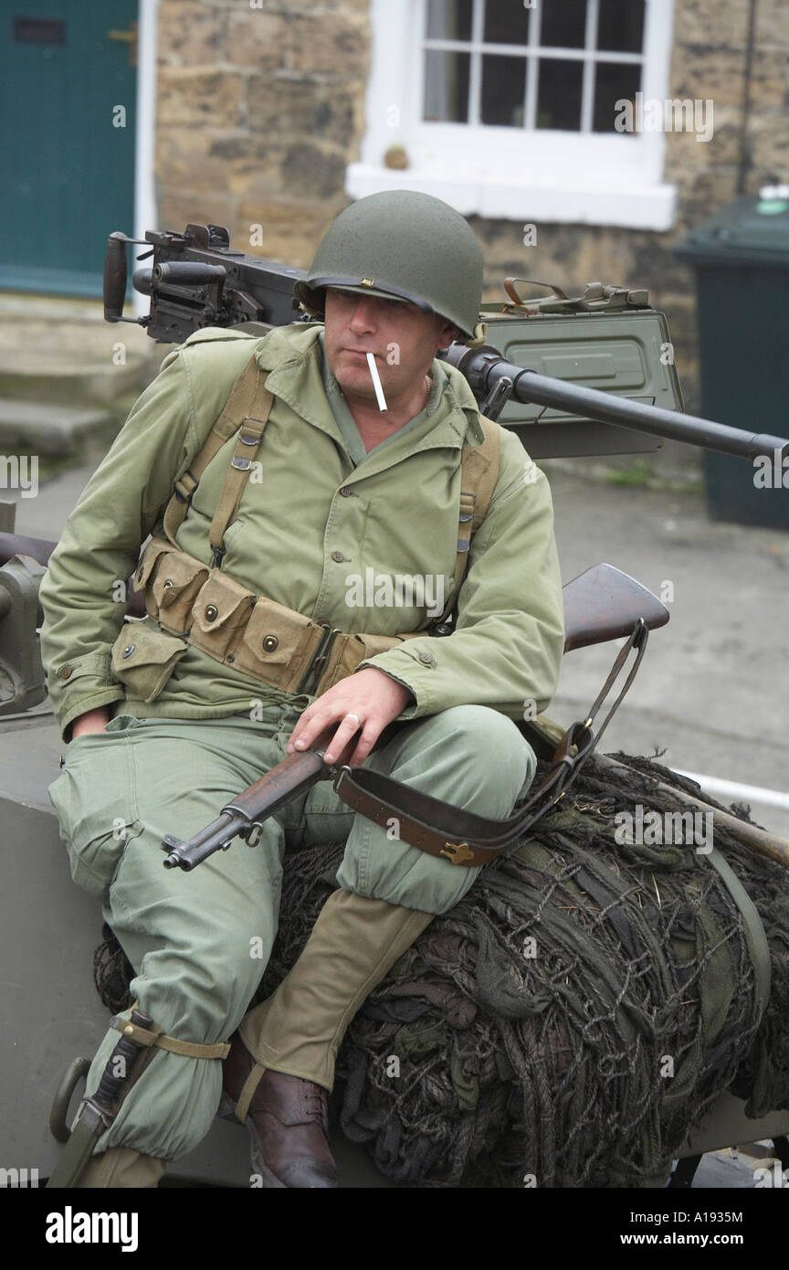 Soldier resting on Armoured Car at the Pickering War weekend held in October every year North Yorkshire Stock Photo