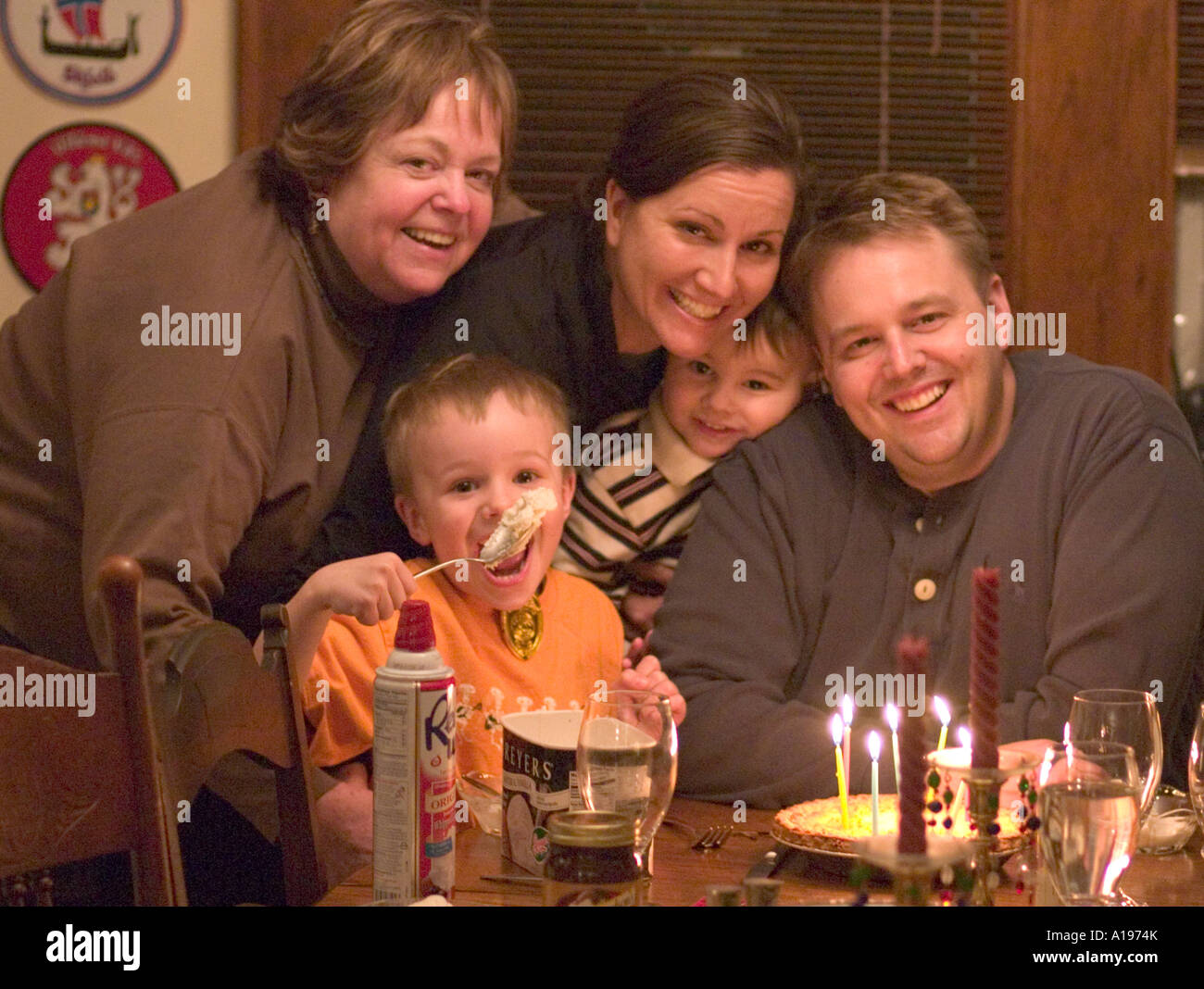 Family enjoying a fun birthday party. St Paul Minnesota USA Stock Photo