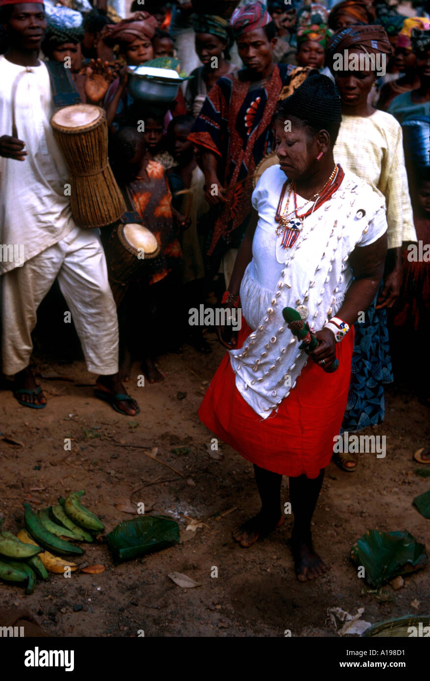 Female witch doctor in market place Nigeria Africa J Ross Stock Photo