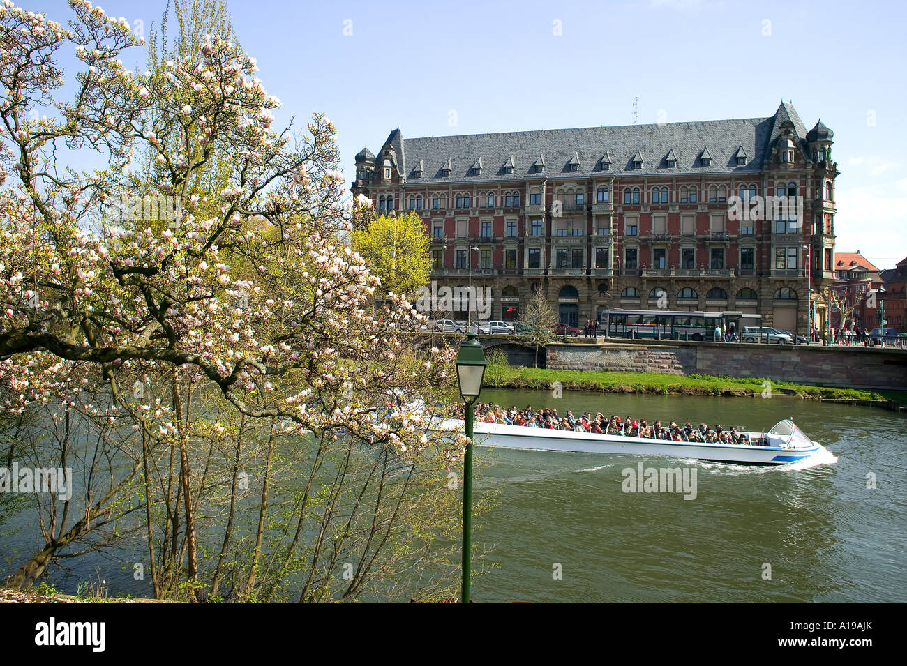Batorama tour boat on Ill river and Gallia student residence, Neustadt district, Strasbourg, Alsace, France, Europe, Stock Photo