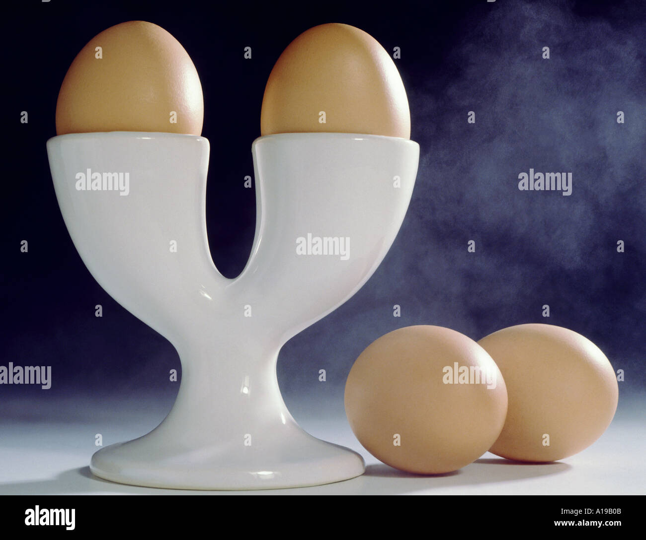 Two eggs in eggcup Stock Photo