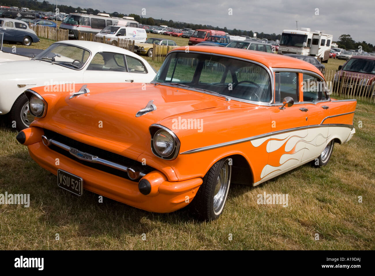 1957 Chevrolet Belair, orange and cream 4 door saloon. Goodwood Motor Circuit, Sussex, UK. Stock Photo