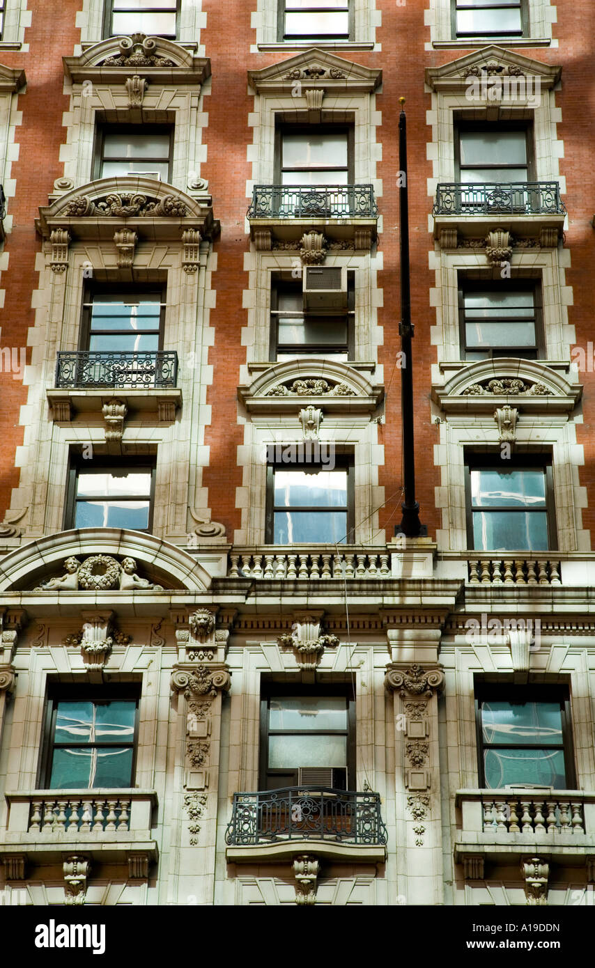 New York apartment building with balcony rails and balustrades Stock