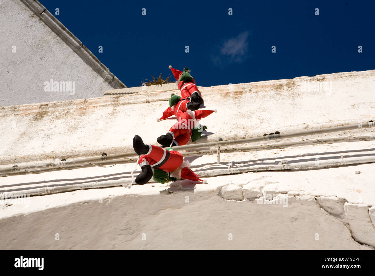 Christmas decorations , santa claus , climbing balcony , Ceglie Messapica , Puglia , Southern Italy . Stock Photo