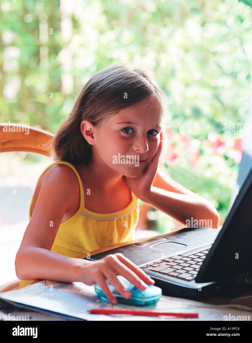 child young girl with laptop computer at home female Stock Photo - Alamy